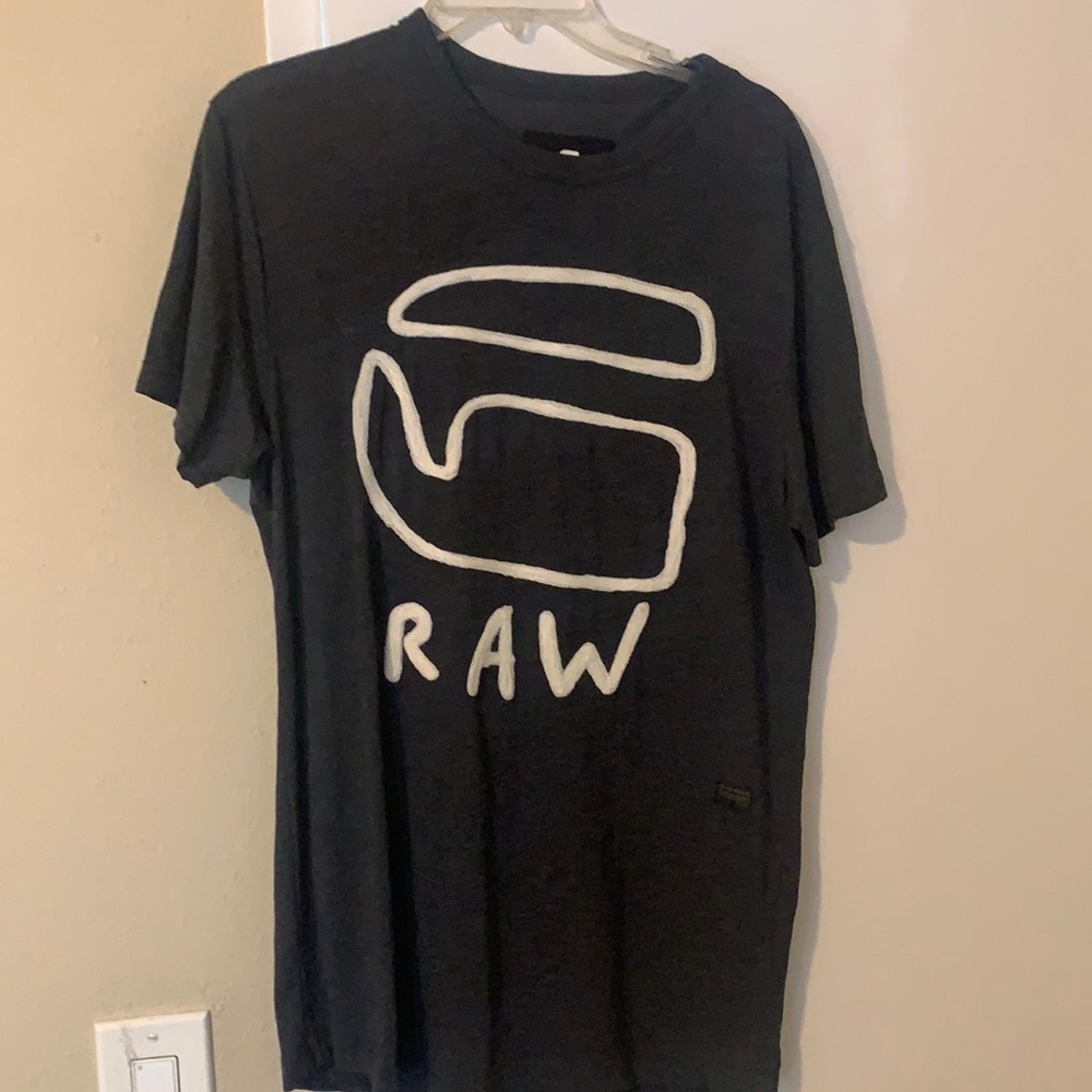 T shirt runs big mediums can fit